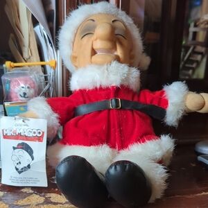 Plush Toy in Red Santa Outfit